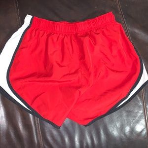 Red Nike shorts